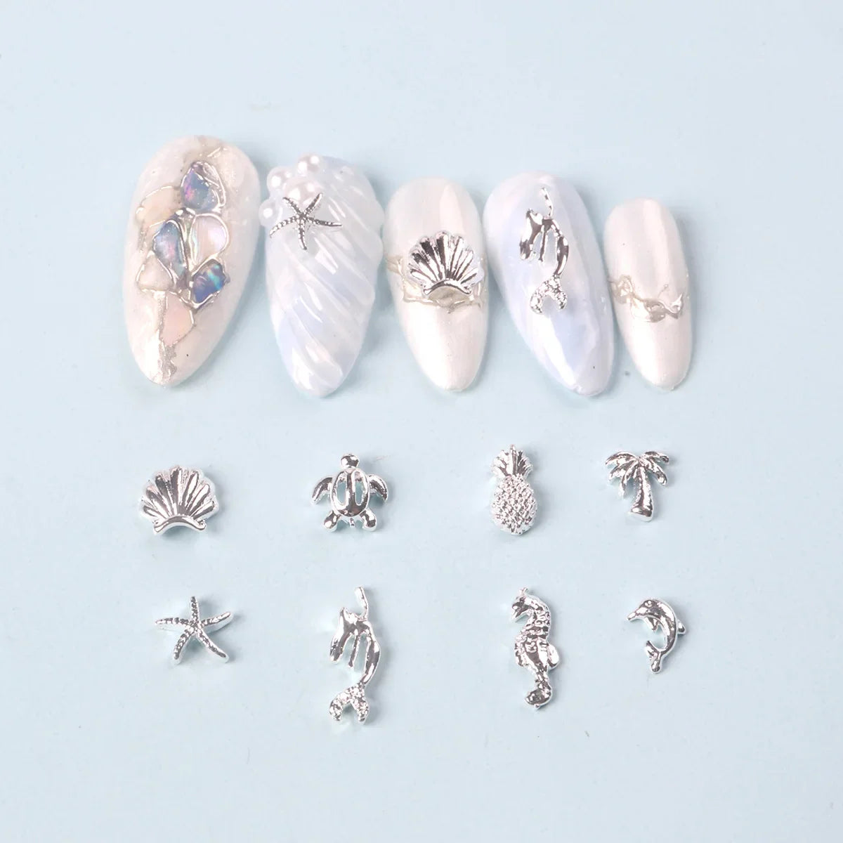 TSZS 50pcs/bag Ocean Starfish Shell Nail Art Charms Silver Beach Starfish Sea Seashell Nail Decoration Metal 3D Charms for Nail