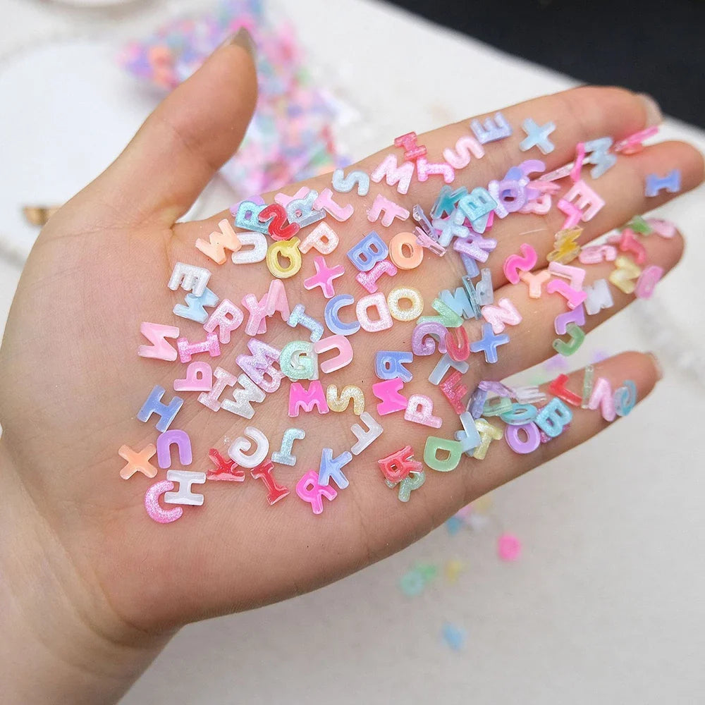 100pcs Mix Letter Nail Art Charms Candy Color with Glitter Resin Nail Rhinestones Kawaii Flatback Alphabet DIY Craft Supplies