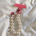 1 x Unisex plain, minimalist mobile phone wrist strap; available in 8 colours with beaded heart-shaped charms; versatile mobile