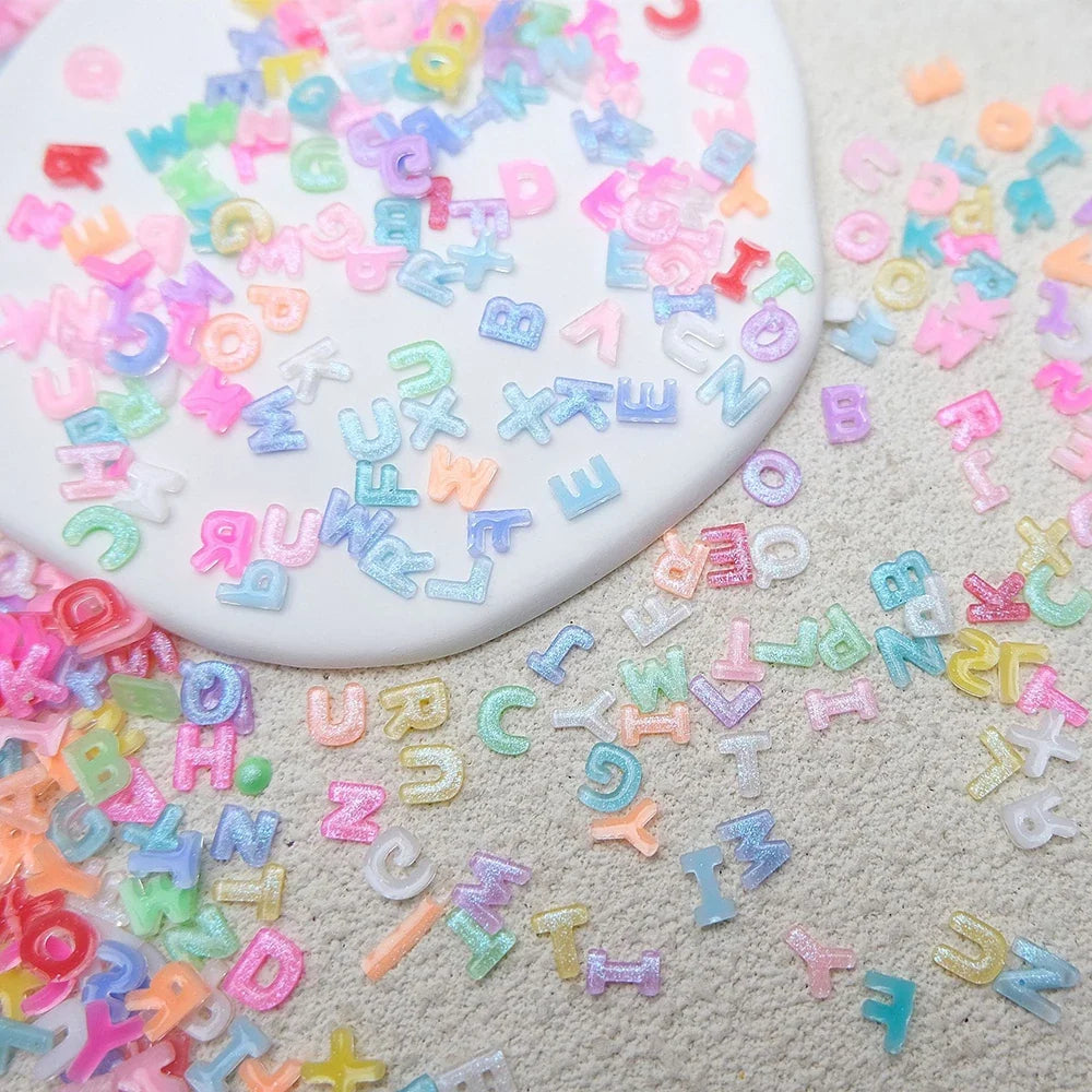100pcs Mix Letter Nail Art Charms Candy Color with Glitter Resin Nail Rhinestones Kawaii Flatback Alphabet DIY Craft Supplies