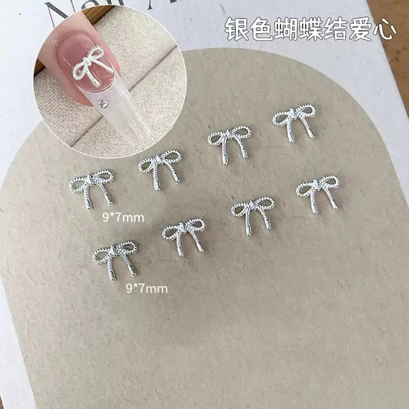 30Pcs Alloy Bowknot Love Nails Charms Decorations 3D Luxury Metal Silver Bows Jewelry Nail Art Parts DIY Manicure Designs Supply