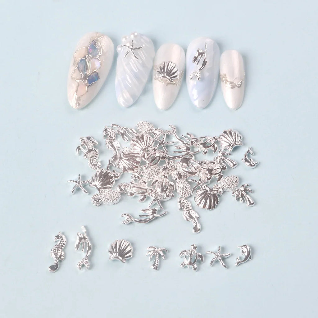 TSZS 50pcs/bag Ocean Starfish Shell Nail Art Charms Silver Beach Starfish Sea Seashell Nail Decoration Metal 3D Charms for Nail
