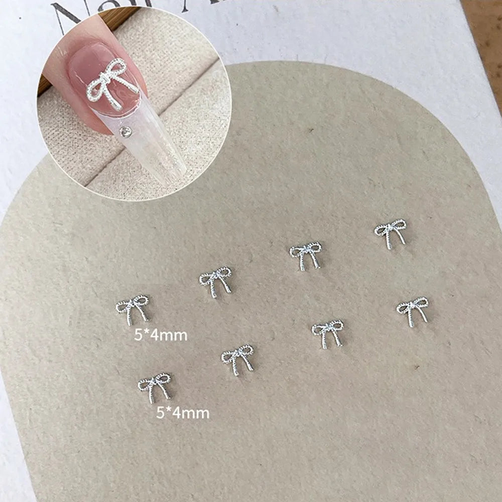 10Pcs/Bag Mini Bowknot Nail Art Charms Super Shiny Alloy Love Nail Decals Silver Metal Nail Art Decorations